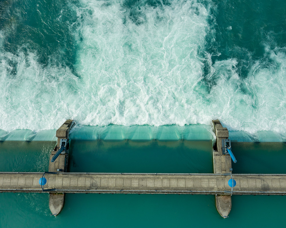 Water cascading over an edge at a water treatment facility